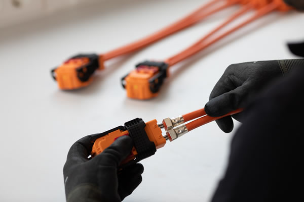We use high-voltage plugs from the manufacturers' brands